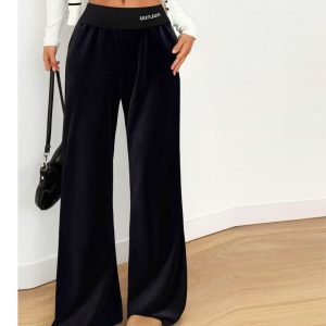 Czarne welurowe spodnie z szeroką nogawką